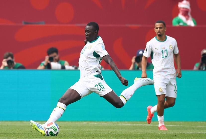 Senegal's midfielder #26 Pape Gueye scores his team's third goal during the 2026 World Cup Group I football match between Senegal and Iraq at the Toronto Stadium in Toronto on June 26, 2026.   Cole Burston / AFP