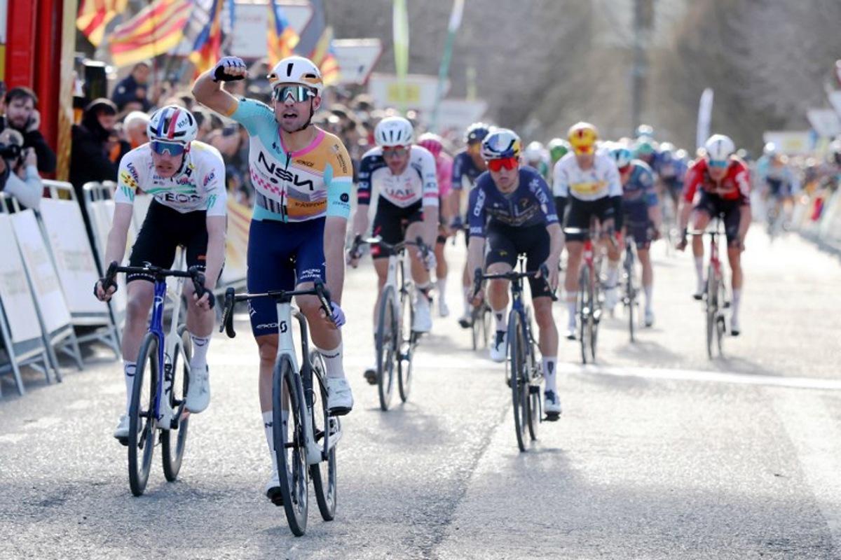 Team NSN Cycling Team's Welsh rider Ethan Vernon (2L) celebrates winning the 4th stage of the 2026 Volta a Catalunya cycling tour of Catalonia, a 151 km race between Mataro and  Camprodon, on March 26, 2026.  Josep LAGO / AFP