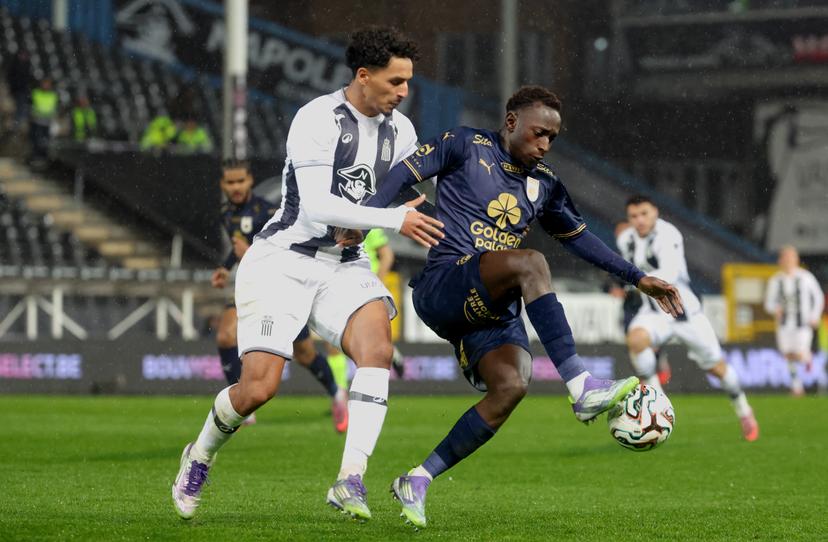 Charleroi's Mehdi Boukamir and RAAL's Oucasse Mendy fight for the ball during a soccer match between Sporting Charleroi and RAAL La Louviere, Saturday 29 November 2025 in Charleroi, on day 16 of the 2025-2026 'Jupiler Pro League' first division of the Belgian championship. BELGA PHOTO VIRGINIE LEFOUR