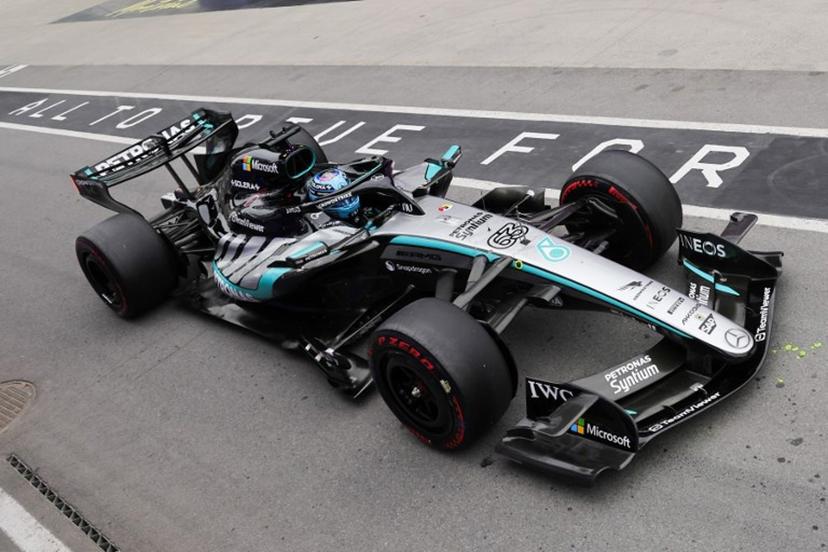 Mercedes' British driver George Russell drives in pit lane during the qualifying session for the 2026 Formula 1 Grand Prix du Canada at Circuit Gilles-Villeneuve in Montreal, Canada, on May 23, 2026.   Cristobal Herrera-Ulashkevich / POOL / AFP