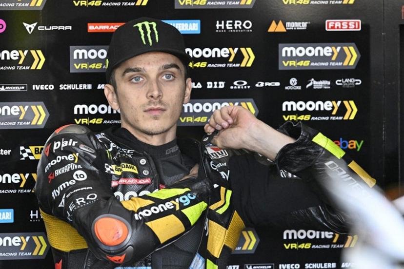 Ducati Italian rider Luca Marini fits his jacket as he waits for the start of the second free practice session of the MotoGP Valencia Grand Prix at the Ricardo Tormo racetrack in Cheste, on November 25, 2023.  JAVIER SORIANO / AFP