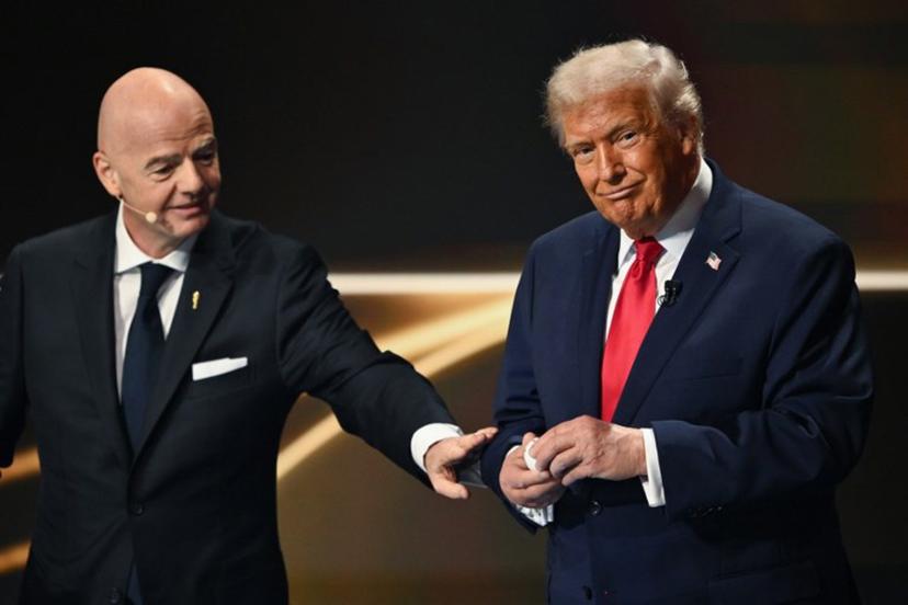 (L/R) FIFA President Gianni Infantino and US President Donald Trump participate in the draw for the 2026 FIFA Football World Cup taking place in the US, Canada and Mexico, at the Kennedy Center, in Washington, DC, on December 5, 2025.  Mandel NGAN / POOL / AFP
