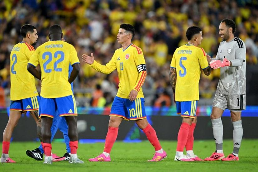 Colombia's midfielder #10 James Rodriguez (C) shakes hands with teammates after winning the international friendly football match between Colombia and Costa Rica at the Nemesio Camacho El Campin stadium in Bogota on June 1, 2026.  Raul ARBOLEDA / AFP