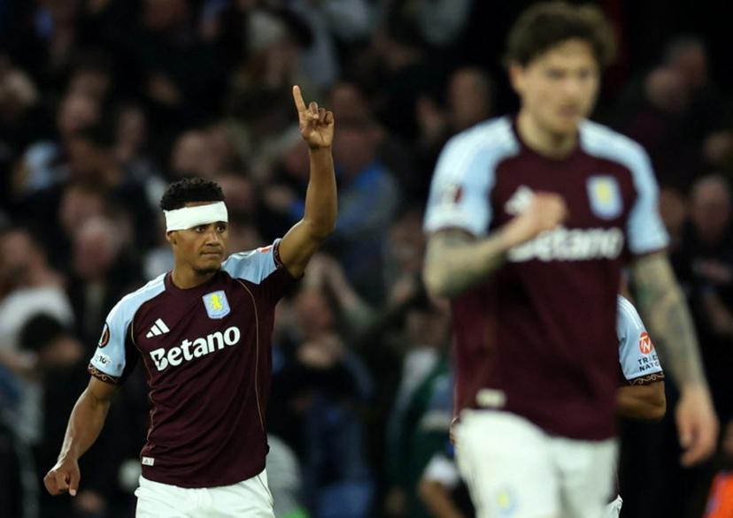 Aston Villa's English striker #11 Ollie Watkins celebrates scoring the opening goal during the UEFA Europa League, semi-final second-leg football match between Aston Villa and Nottingham Forest at Villa Park in Birmingham, central England on May 7, 2026.  Darren Staples / AFP