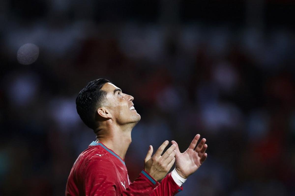 Portugal's forward #07 Cristiano Ronaldo reacts during the international friendly football match between Portugal and Nigeria at Magalhaes Pessoa Stadium in Leiria, on June 10, 2026.  FILIPE AMORIM / AFP
