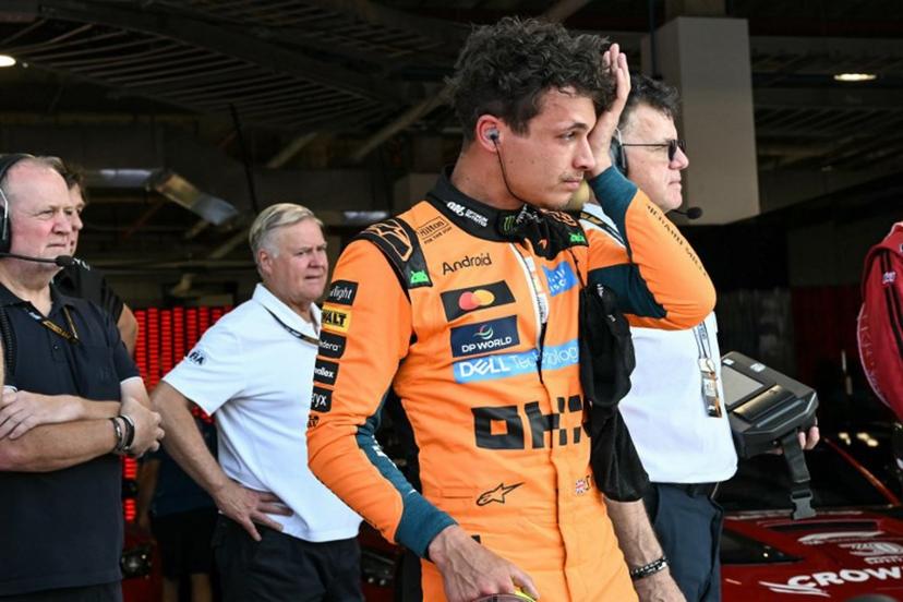 McLaren's British driver Lando Norris exits his car after finishing in the pole position during Sprint qualifying ahead of the 2026 Miami Formula One Grand Prix at Miami International Autodrome in Miami Gardens, Florida, on May 1, 2026.   CHANDAN KHANNA / AFP