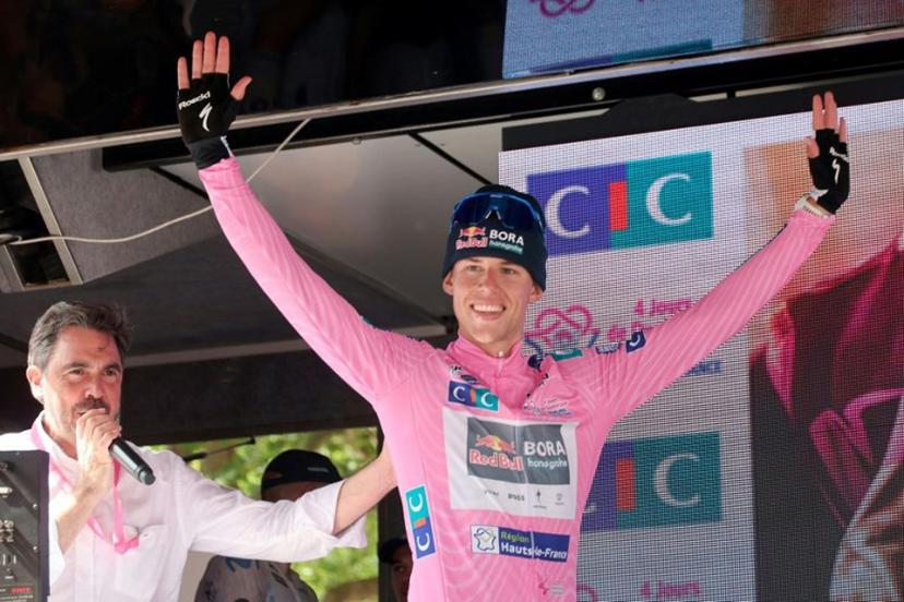 Overall winner Red Bull Bora Hansgrohe's New Zealand's Laurence Pithie celebrates on the podium after the fifth and last stage of the 2026 Four Days of Dunkirk road cycling race, 184km from Saint-Omer to Dunkirk, in Dunkirk, northern France, on May 24, 2026.  Francois LO PRESTI / AFP