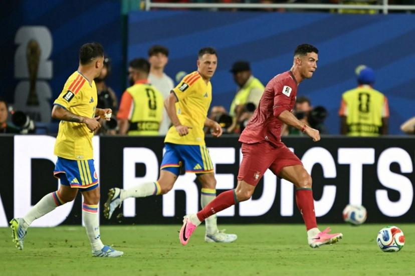Portugal's forward #07 Cristiano Ronaldo kicks the ball during the 2026 World Cup Group K football match between Colombia and Portugal at the Miami Stadium in Miami Gardens on June 27, 2026.   CHANDAN KHANNA / AFP