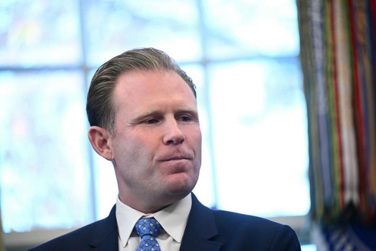 Executive Director of the White House Task Force on the FIFA World Cup 2026 Andrew Giuliani looks on during a meeting with US President Donald Trump and the Task Force in the Oval Office of the White House in Washington, DC on November 17, 2025.  Brendan SMIALOWSKI / AFP