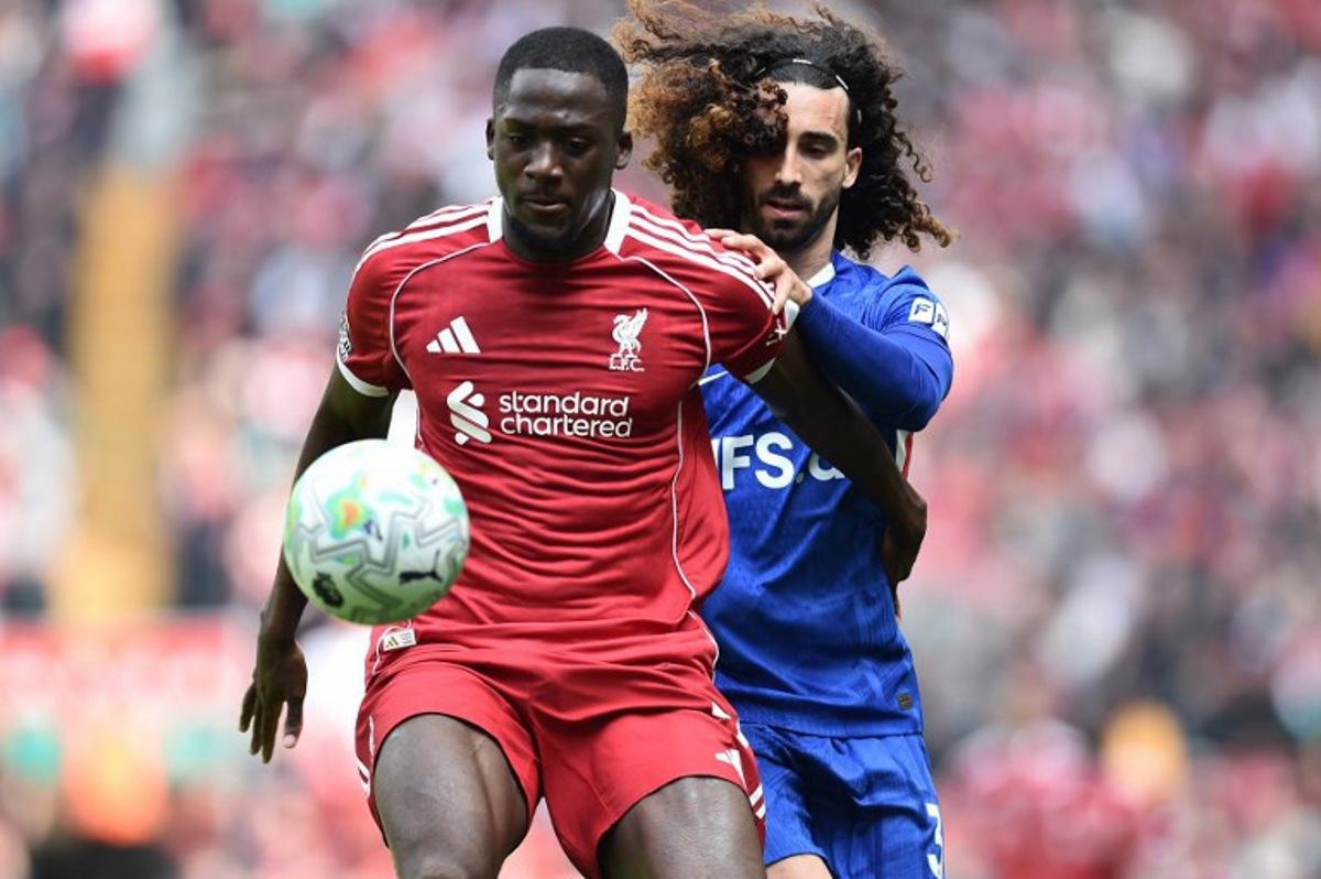 Chelsea's Spanish defender #03 Marc Cucurella (R) vies with Liverpool's French defender #05 Ibrahima Konate during the English Premier League football match between Liverpool and Chelsea at Anfield in Liverpool, north west England on May 9, 2026.  PETER POWELL / AFP