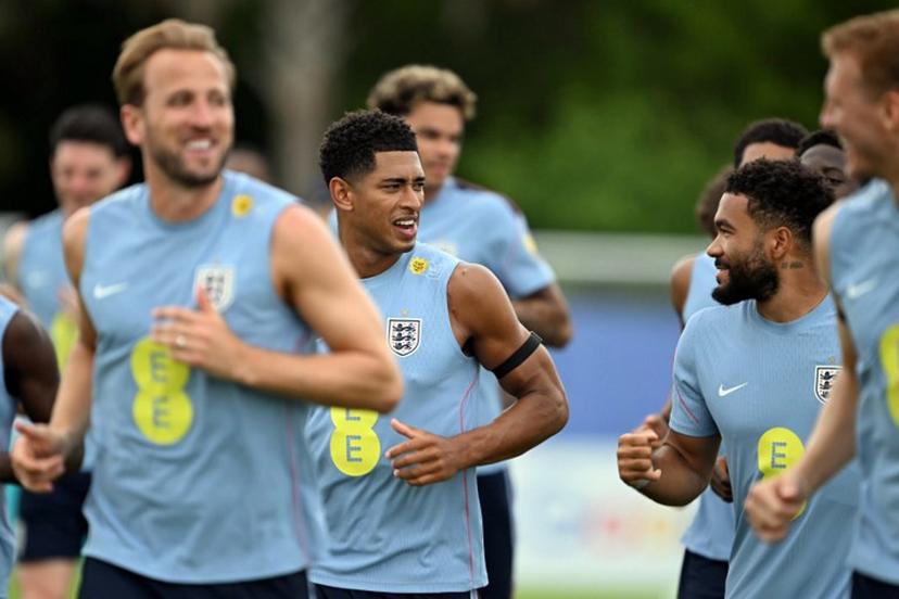 England's midfielder #10 Jude Bellingham (2ndL) and England's defender #24 Reece James take part in a training session as part of the team's preparation for its FIFA World Cup football tournament opening match against Croatia at the team's training camp in Palm Beach Gardens on June 9, 2026.  CHANDAN KHANNA / AFP