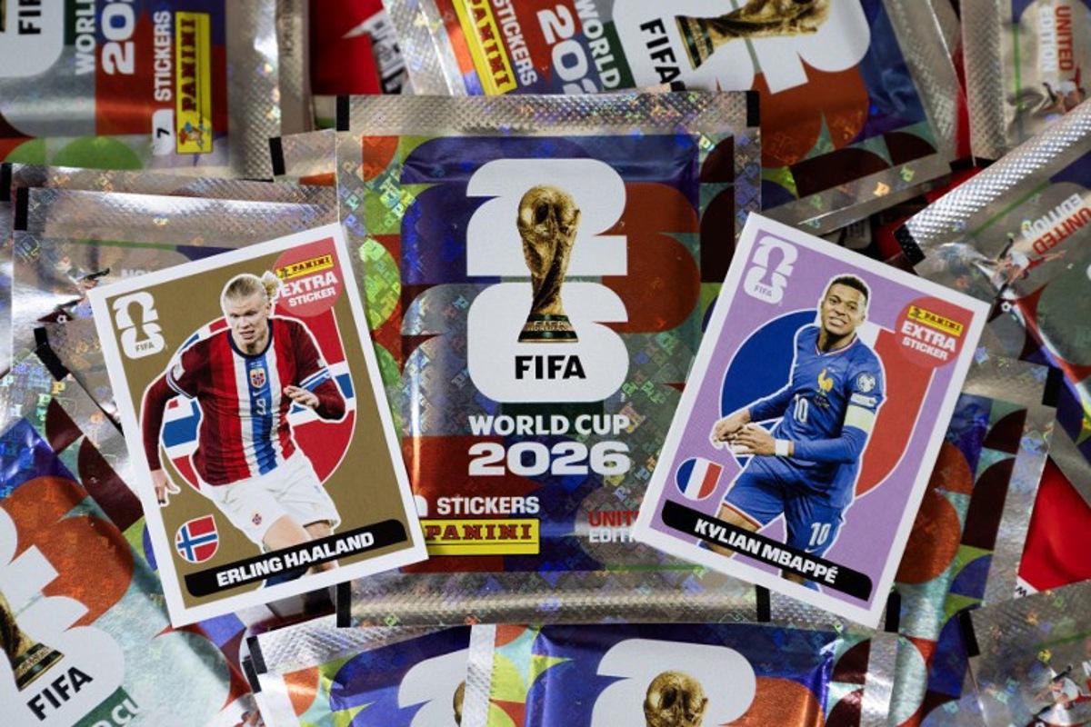 Collectible cards for the upcoming 2026 FIFA World Cup hosted by the US, Canada and Mexico, of Norway's forward Erling Haaland (L) and France's forward Kylian Mbappe, are displayed with packets at the Panini Group factory in Modena, northern Italy, on April 28, 2026.  The Panini Group holds the exclusive rights for the official collectible cards and stickers for the 2026 FIFA World Cup hosted by the US, Canada, and Mexico. MARCO BERTORELLO / AFP