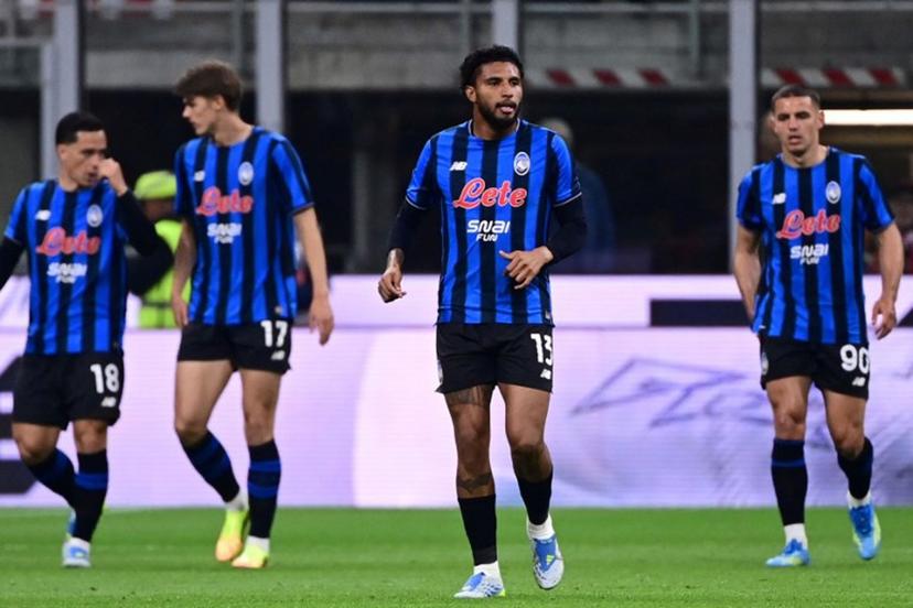 Atalanta's Brazilian midfielder #13 Ederson (C) reacts after scoring his team's first goal during the Italian Serie A football match between AC Milan and Atalanta Bergamo at San Siro Stadium in Milan on May 10, 2026.  Piero CRUCIATTI / AFP