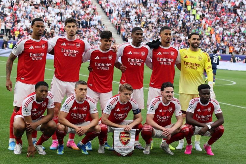 (back row from L to R) Arsenal's Brazilian defender #06 Gabriel Magalhaes, Arsenal's German midfielder #29 Kai Havertz, Arsenal's Ecuadorian defender #05 Piero Hincapie, Arsenal's Spanish defender #03 Cristhian Mosquera, Arsenal's French defender #02 William Saliba and Arsenal's Spanish goalkeeper #01 David Raya and (front row from L to R) Arsenal's English midfielder #49 Myles Lewis-Skelly, Arsenal's Belgian midfielder #19 Leandro Trossard, Arsenal's Norwegian midfielder #08 Martin Odegaard, Arsenal's English midfielder #41 Declan Rice and Arsenal's English midfielder #07 Bukayo Saka pose for a team photo before the UEFA Champions League final football match between Paris Saint-Germain (PSG) and Arsenal FC at the Puskas Arena in Budapest on May 30, 2026.   Odd ANDERSEN / AFP