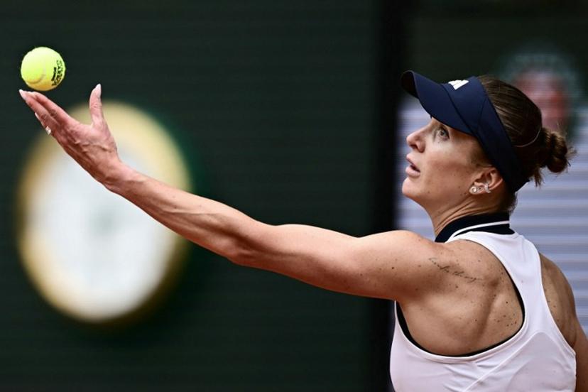 Ukraine's Elina Svitolina serves to Switzerland's Belinda Bencic during their women's singles match on day 8 of the French Open tennis tournament on Court Philippe-Chatrier at the Roland-Garros Complex in Paris on May 31, 2026.  JULIEN DE ROSA / AFP