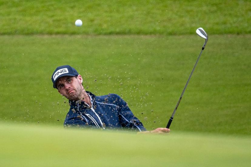 USA's Alex Smalley plays a shot during the Baycurrent Classic golf tournament in Yokohama on October 11, 2025.  Philip FONG / AFP