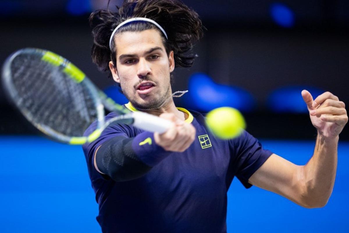 Spain's Carlos Alcaraz returns the ball to USA's Tommy Paul (not pictured) during the quarter-final match at the Erste Bank Open 2026 ATP 500 tennis tournament in Vienna, Austria, on October 30, 2026.  GEORG HOCHMUTH / APA / AFP