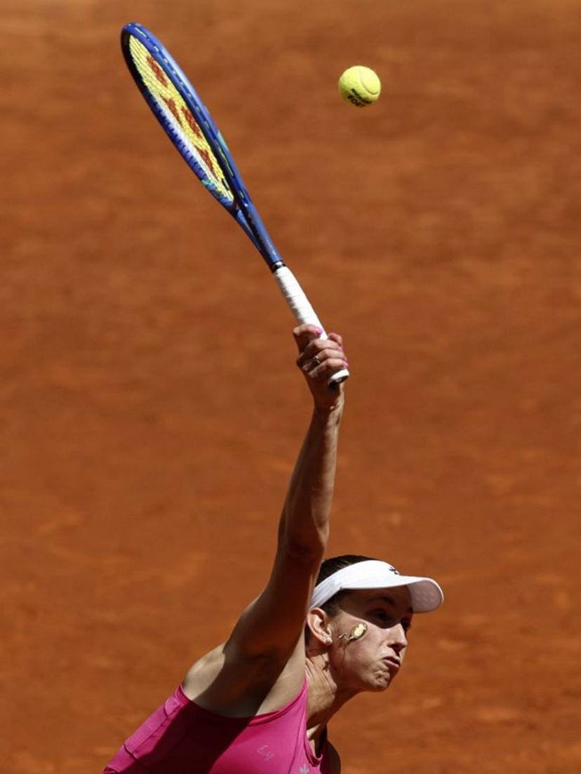 Belgium's Elise Mertens serves to Czech Republic's Karolina Pliskova during their 2026 WTA Tour Madrid Open tennis tournament singles match at the Caja Magica in Madrid, on April 26, 2026.   OSCAR DEL POZO / AFP