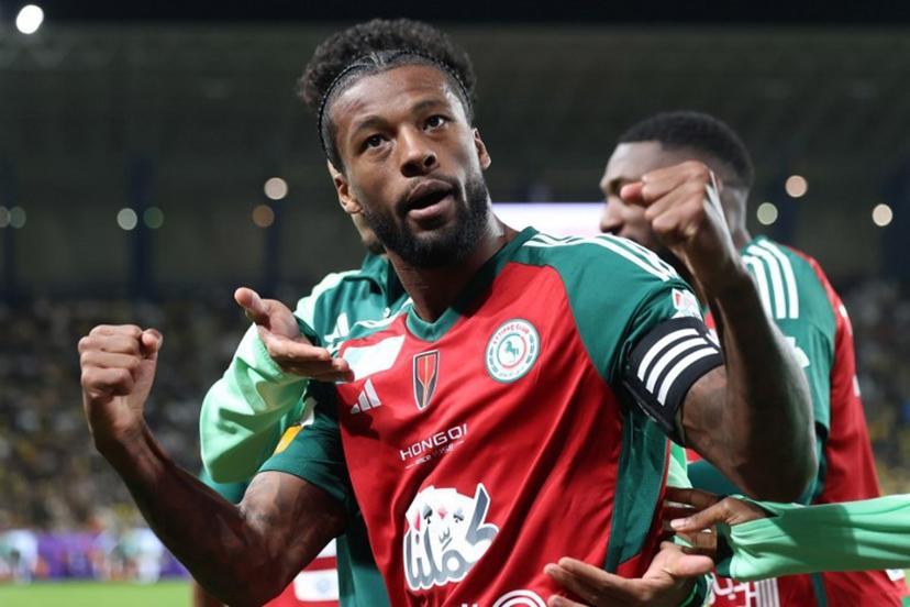 Ettifaq's Dutch midfielder #08 Georginio Wijnaldum celebrates scoring his team's third goal during the Saudi Pro League football match between Al-Nassr and Al-Ettifaq at Al-Awwal Park in Riyadh on February 21, 2025.  Fayez NURELDINE / AFP