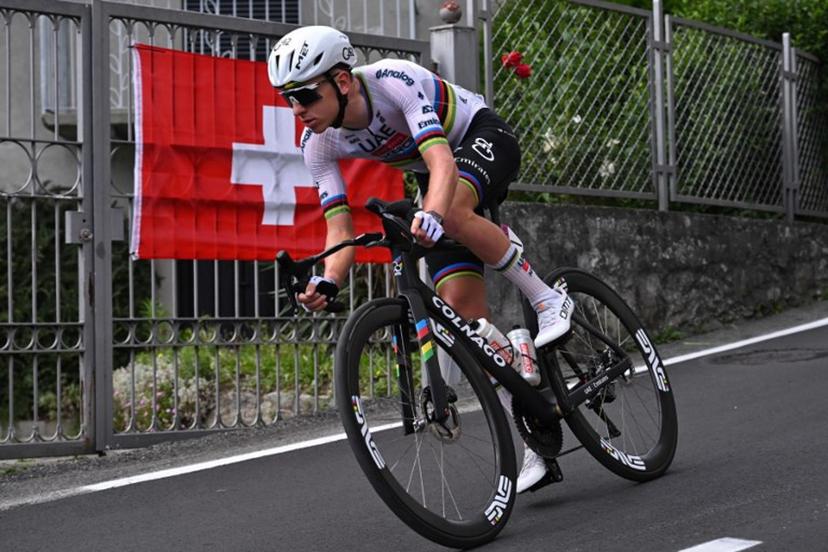 Slovenia's rider Tadej Pogacar of team UAE Emirates - XRG  competes in the first stage of the Men's Tour of Switzerland (Tour de Suisse) cycling race, in Sondrio, Italy, on June 17, 2026.  Marco BERTORELLO / AFP