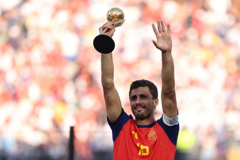 Spain's midfielder #16 Rodri holds the Golden Ball award during the award ceremony of the 2026 World Cup football tournament final match between Spain and Argentina at the New York/New Jersey Stadium in East Rutherford on July 19, 2026.    Odd ANDERSEN / AFP