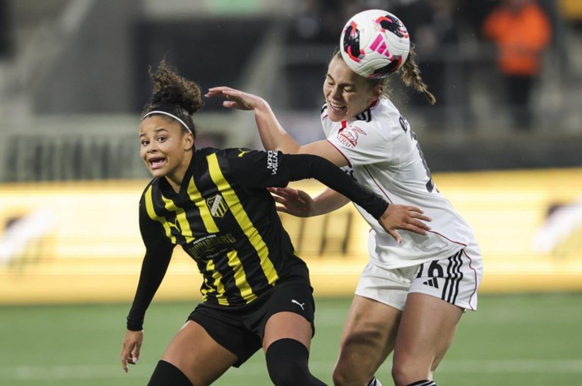 Hacken's Felicia Schroeder (L) and Eintracht Frankfurt's Marthine Ostenstad vie for the ball during the UEFA Women's Europa Cup second leg semi-final football match between BK Hacken and Eintracht Frankfurt at Hisingen Arena in Gothenburg, Sweden, on April 2, 2026.  Adam Ihse / TT / TT News Agency / AFP