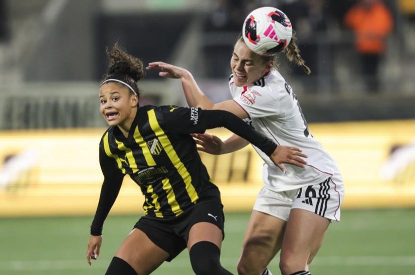 Hacken's Felicia Schroeder (L) and Eintracht Frankfurt's Marthine Ostenstad vie for the ball during the UEFA Women's Europa Cup second leg semi-final football match between BK Hacken and Eintracht Frankfurt at Hisingen Arena in Gothenburg, Sweden, on April 2, 2026.  Adam Ihse / TT / TT News Agency / AFP