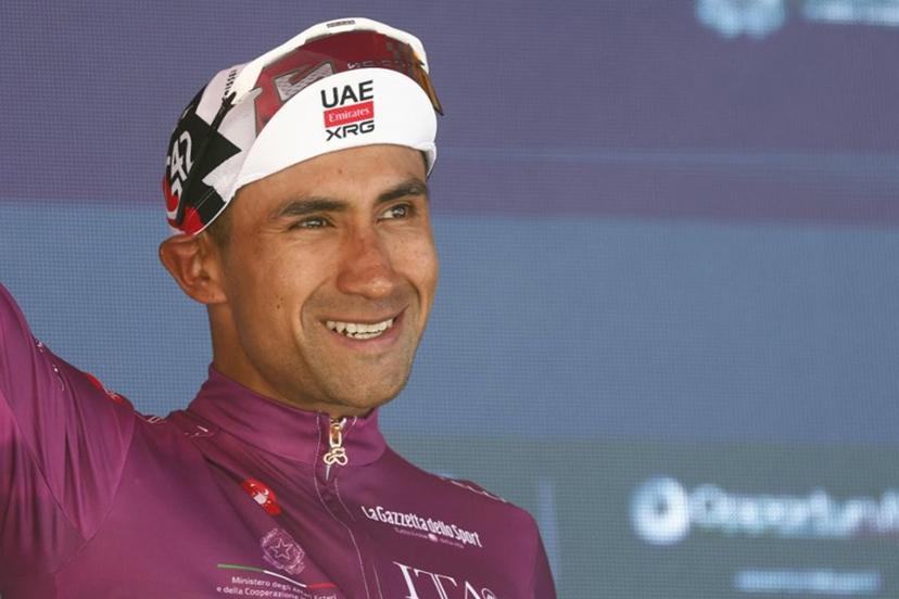 UAE Team Emirates - XRG Ecuadorian rider Jhonatan Narvaez poses with the best sprinter's cyclamen jersey on the podium of the 14th stage of the Giro d'Italia 2026 - Tour of Italy cycling race between Aosta and Pila (Gressan), Italy, on May 23, 2026.  Luca Bettini / AFP