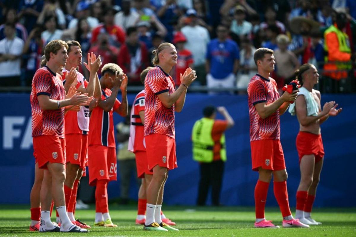 Norway's forward #09 Erling Braut Haaland (C) gestures at the end of the 2026 World Cup Group I football match between Norway and France at the Boston Stadium in Foxborough on June 26, 2026.  MAURO PIMENTEL / AFP