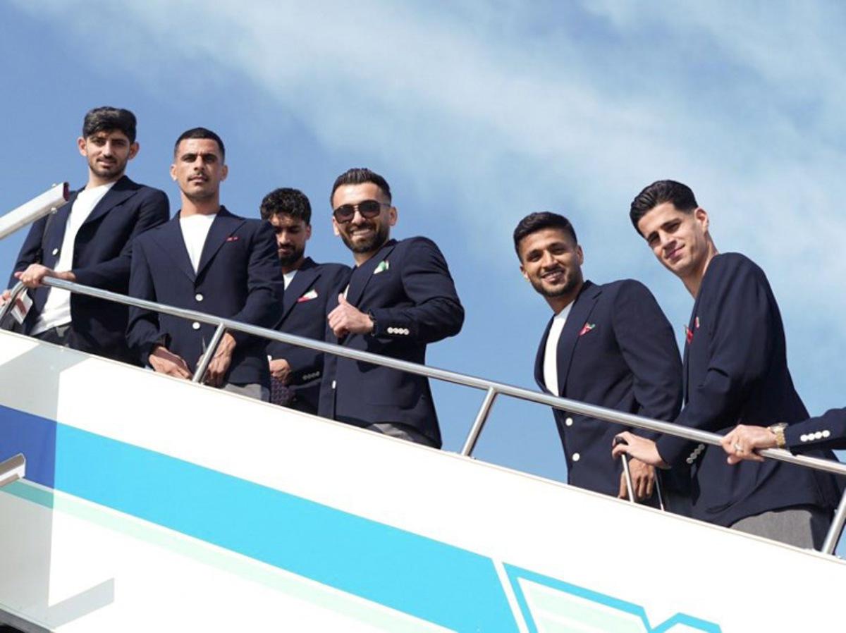 This handout photograph taken and released by Iran Football Federation Press Office on June 6, 2026 shows Iran's national team players (From L) defender Mehdi Torabi, left winger Mehdi Ghayedi, midfielder Amirmohammad Razzaghinia, left winger Mohammad Mohebi and goalkeeper Payam Niazmand boarding a plane at Antalya Airport ahead of their departure to Mexico for the FIFA 2026 World Cup football tournament, in Antalya, Turkey, on June 6, 2026. Iran lashed out at the United States on June 6 for refusing visas to some of its World Cup squad support staff as the players were to leave Turkey for Mexico. Handout / Iran football Federation Press office / AFP