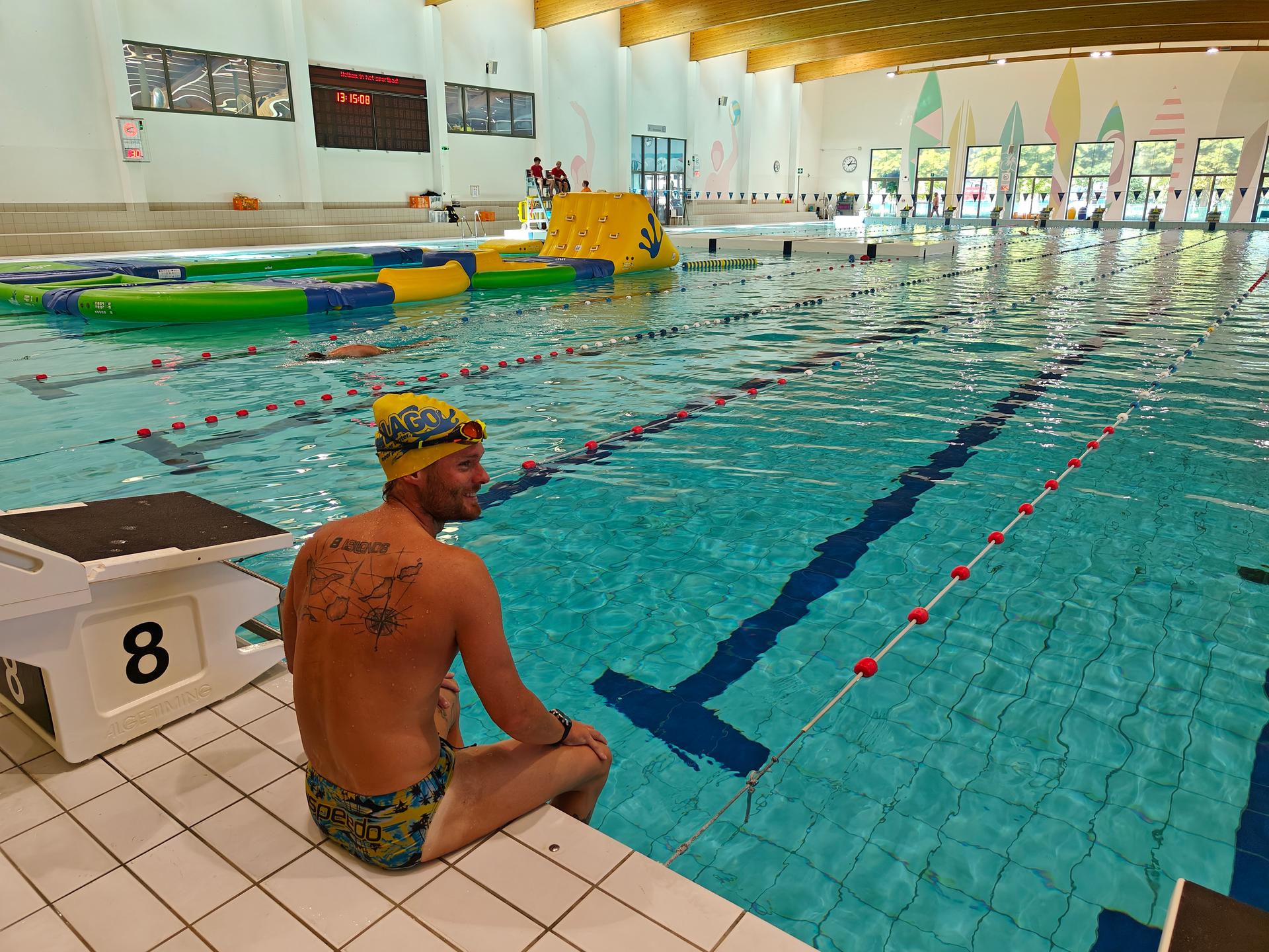 Matthieu Bonne pictured during, the preparations for his the world record attempt Wednesday 23 August 2023 in Brugge. Bonne already has several records to his name and is venturing into another record attempt: swimming in an ocean, bay or sea for as long as possible and without aids at a stretch. To break that record, he must swim more than 125.7 kilometres. Bonne will attempt it in the Gulf of Corinth in Greece. BELGA PHOTO MAAIKE TIJSSEN