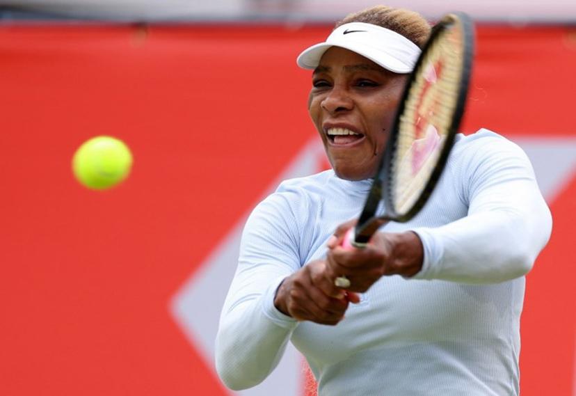 US player Serena Williams hits a shot during a practice session at the HSBC WTA tennis Championships at Queen's Club in west London on June 12, 2026. Serena Williams' bid to win the Queen's Club doubles title on her return to tennis came to a premature end on Thursday after the American legend's partner Victoria Mboko was forced to withdraw from the tournament. Adrian Dennis / AFP