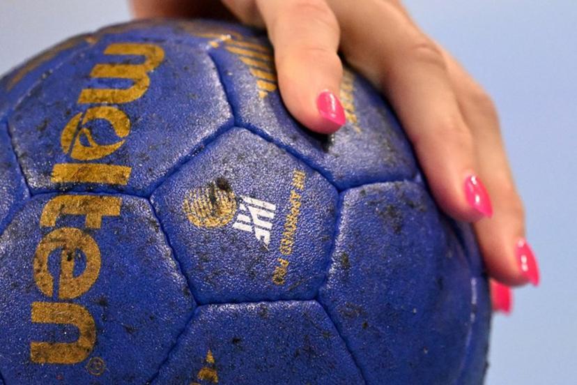 Germany's pivot #93 Julia Behnke warms up with the ball prior the women's Handball Olympic qualifying match between Germany and Montenegro in Neu-Ulm, southern Germany on April 13, 2024.  Kirill KUDRYAVTSEV / AFP