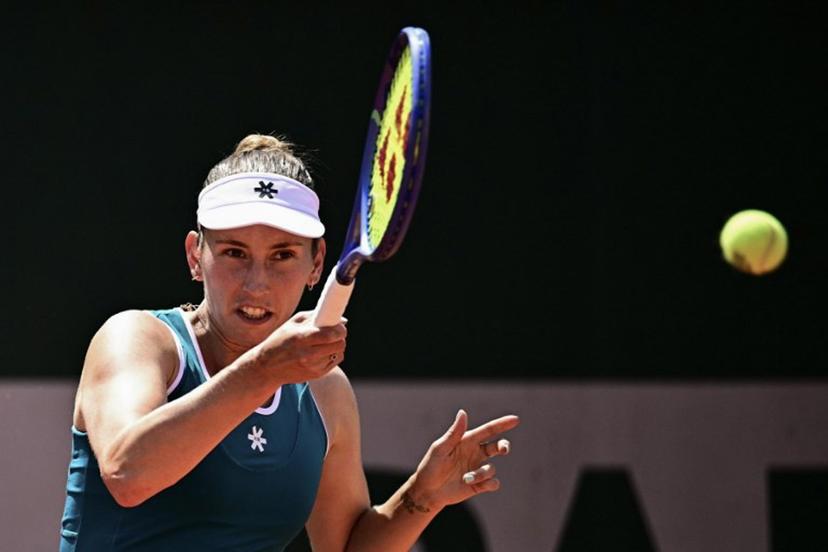 Belgium's Elise Mertens plays a forehand return to Poland's Maja Chwalinska during their women's singles match on day 5 of the French Open tennis tournament at the Roland-Garros Complex in Paris on May 28, 2026.  JULIEN DE ROSA / AFP