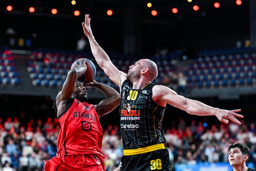 Antwerp's Rasheed Bello and Oostende's Pierre-Antoine Gillet pictured in action during a basketball match between Antwerp Giants and BC Oostende, Thursday 04 June 2026, in Antwerp, on the first round (out of 5) of the Final of the Playoffs of the 'BNXT League' Belgian/ Dutch first division basket championship. BELGA PHOTO TOM GOYVAERTS