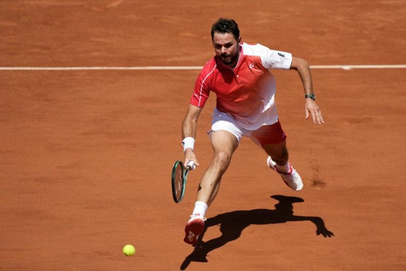 Switzerland's Stan Wawrinka plays against Netherlands' Jesper De Jong during their men's singles match on day 2 of the French Open tennis tournament on Court Simonne-Mathieu at the Roland-Garros Complex in Paris on May 25, 2026.  Dimitar DILKOFF / AFP