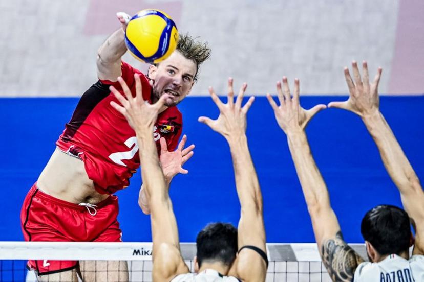 Belgium's Ferre Reggers attempts to score against Italy during the 2025 Men's Volleyball World Championship at the Araneta Coliseum in Quezon City on September 16, 2025.  SHERWIN VARDELEON / AFP