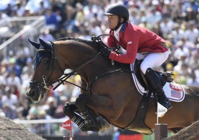 USA's Kent Farrington on his horse Voyeur competes in the individual equestrian show jumping event at the Olympic Equestrian Centre during the Rio 2016 Olympic Games in Rio de Janeiro on August 19, 2016. 
PHILIPPE LOPEZ / AFP