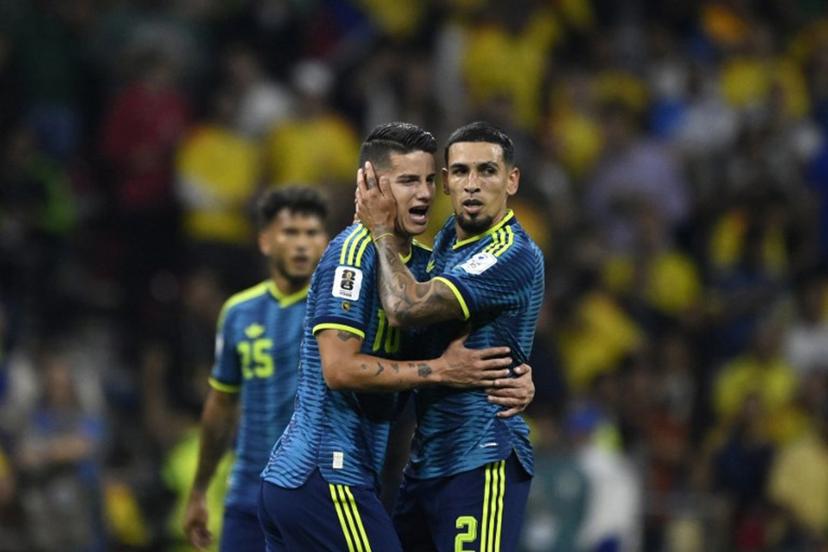 Colombia's defender #02 Daniel Munoz (R) celebrates after scoring his team's first goal with teammate midfielder #10 James Rodriguez during the 2026 World Cup Group K football match between Uzbekistan and Colombia at the Mexico City Stadium in Mexico City on June 17, 2026.   Alfredo ESTRELLA / AFP