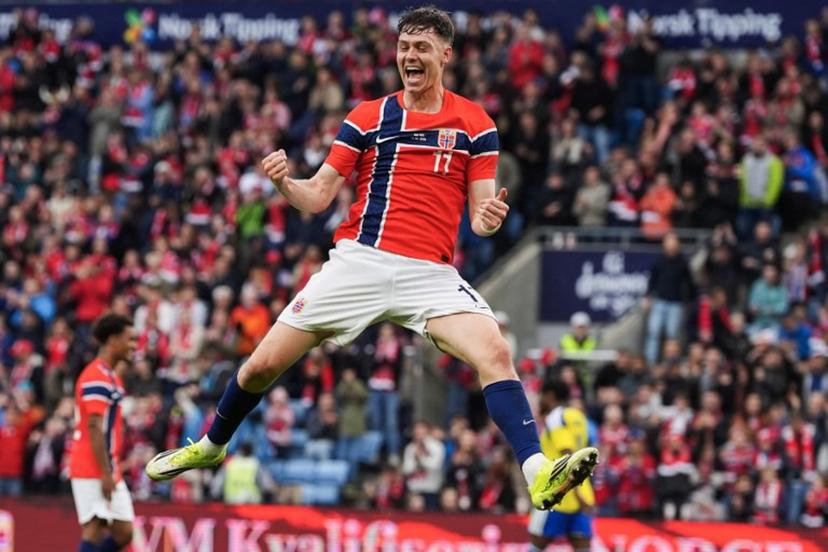 Norway's forward #11 Jorgen Strand Larsen celebrates scoring the 3-0 goal with his teammates during the friendly match between Norway and Sweden at Ullevaal Stadium, on June 1, 2026 ahead of the 2026 FIFA World Cup football tournament.  Lise Åserud / NTB / AFP
