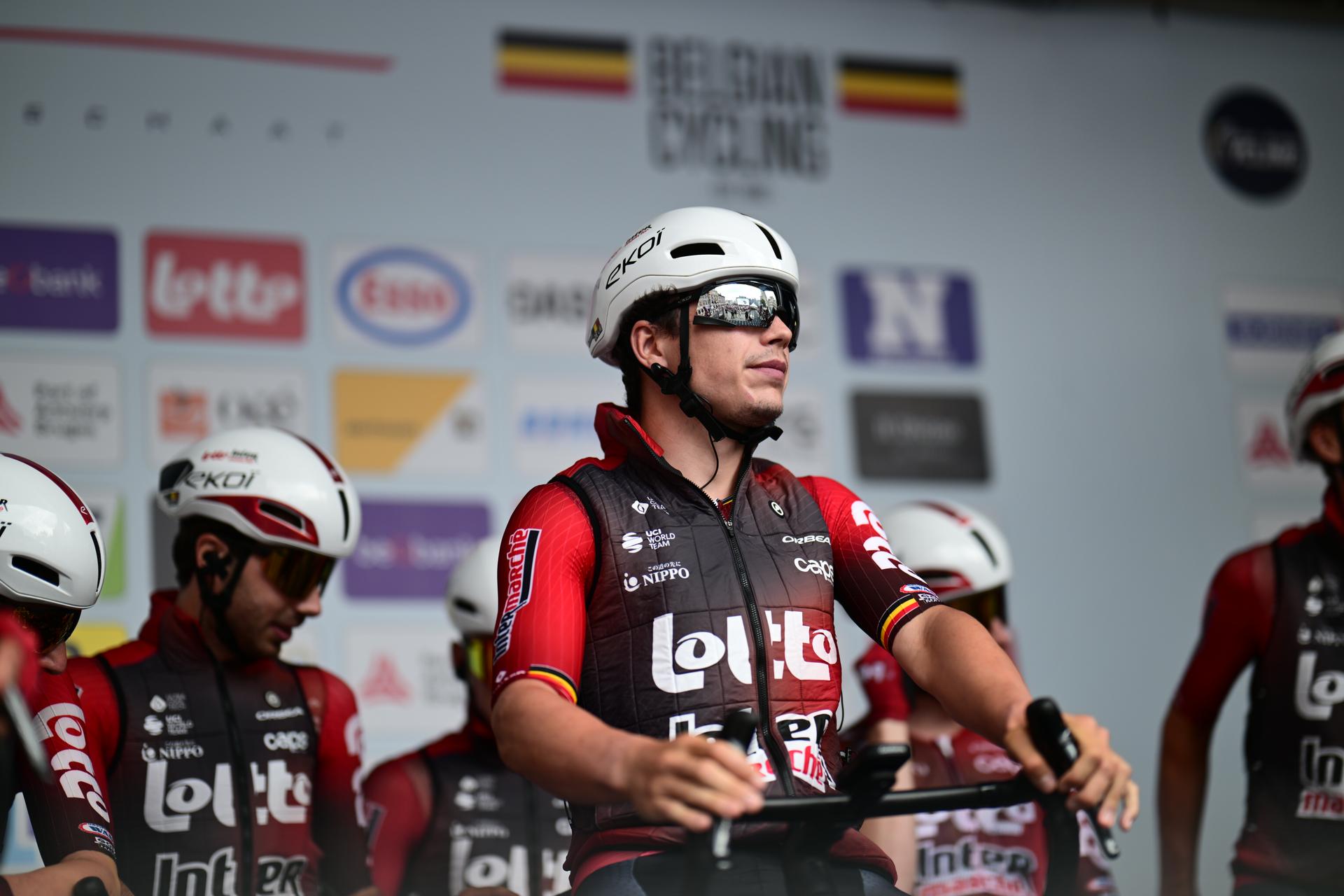 Belgian Arnaud De Lie (C) and his teammates of Lotto-Intermarche pictured at the start of the men's elite race (240km) of the Belgian Cycling Championships, from the Grote Markt square in Antwerp to Brasschaat on Sunday 28 June 2026. BELGA PHOTO TOM GOYVAERTS