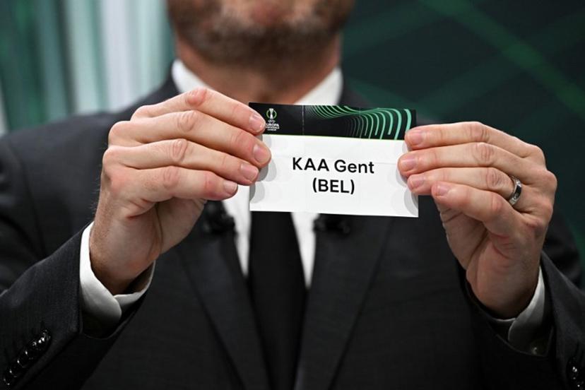 UEFA Europa Conference League final ambassador Czech former footballer Vladimir Smicer shows the paper slip of KAA Gent (BEL) during the draw for the quarter-final, semi-final and final of the 2022-2023 UEFA Europa Conference League football tournament, in Nyon, on March 17, 2023.  Fabrice COFFRINI / AFP