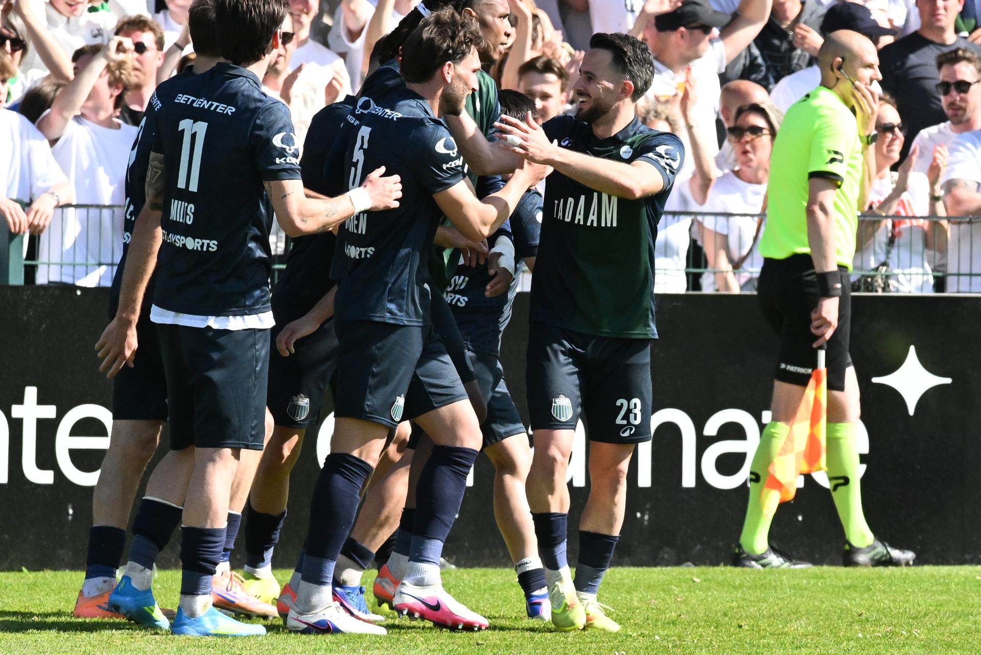 Hasselt's Jerome Kroonen celebrates after scoring during a soccer match between Sporting Hasselt and KFC Dessel Sport, Sunday 26 April 2026 in Hasselt, on the last day of the first serie of voetbal vlaanderen of the 2025-2026 championship. The winner of the serie is promoted to Challenger Pro League. BELGA PHOTO JILL DELSAUX
