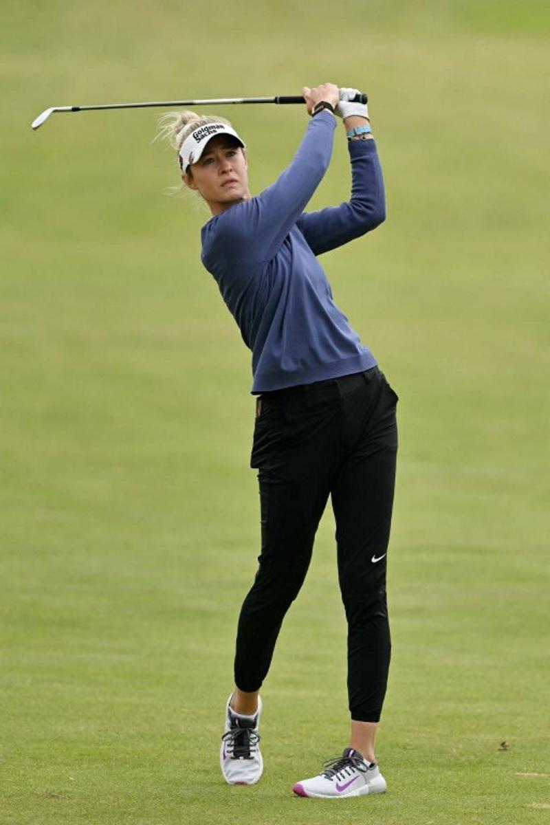 US player Nelly Korda plays her second shot on the second hole on day three of the Women's British Open Golf Championship, at Royal Porthcawl in south Wales on August 2, 2025.  Glyn KIRK / AFP