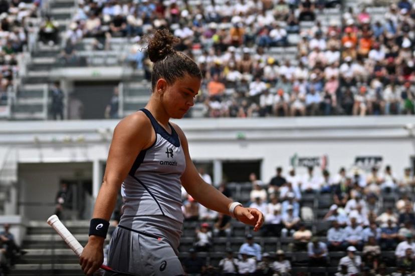 Italy's Jasmine Paolini prepares to serve against Belgium's Elise Mertens during the WTA Rome Open tennis tournament at Foro Italico in Rome on May 9, 2026.   Tiziana FABI / AFP