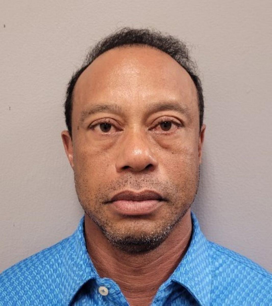 This handout mugshot released on March 27, 2026 provided by the Martin County Sheriff's Office shows the mugshot of US golfer Tiger Woods, 50, who was arrested in Jupiter Island, Florida on March 27, 2026. The golf icon was arrested and charged with driving under the influence after a rollover crash near his Florida home, authorities said. HANDOUT / Florida Department of Corrections / AFP