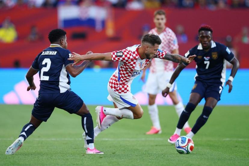 Croatia's forward #24 Marco Pasalic is fouled by Panama's defender #02 Cesar Blackman during the 2026 World Cup Group L football match between Panama and Croatia at the Toronto Stadium in Toronto on June 23, 2026.   Cole Burston / AFP