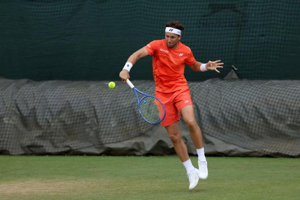Norway's Casper Ruud returns to his traning partner at the practice courts at The All England Lawn Tennis and Croquet Club in Wimbledon, southwest London, on June 28, 2026, ahead of the 2026 Wimbledon Championships.  Adrian Dennis / AFP