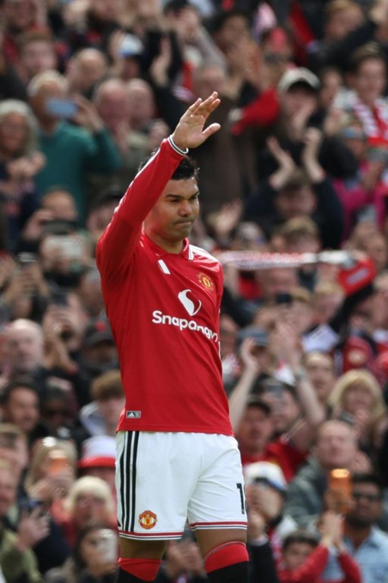Manchester United's Brazilian midfielder #18 Casemiro gestures to supporters as he leaves the game sunstituted on his final home appearance during the English Premier League football match between Manchester United and Nottingham Forest at Old Trafford in Manchester, north west England, on May 17, 2026.  Darren Staples / AFP
