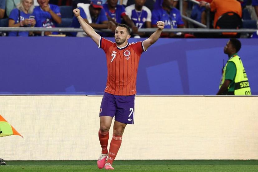 Scotland's midfielder #07 John McGinn celebrates after scoring his team's first goal during the 2026 World Cup Group C football match between Haiti and Scotland at the Boston Stadium in Foxborough on June 13, 2026.  FRANCK FIFE / AFP